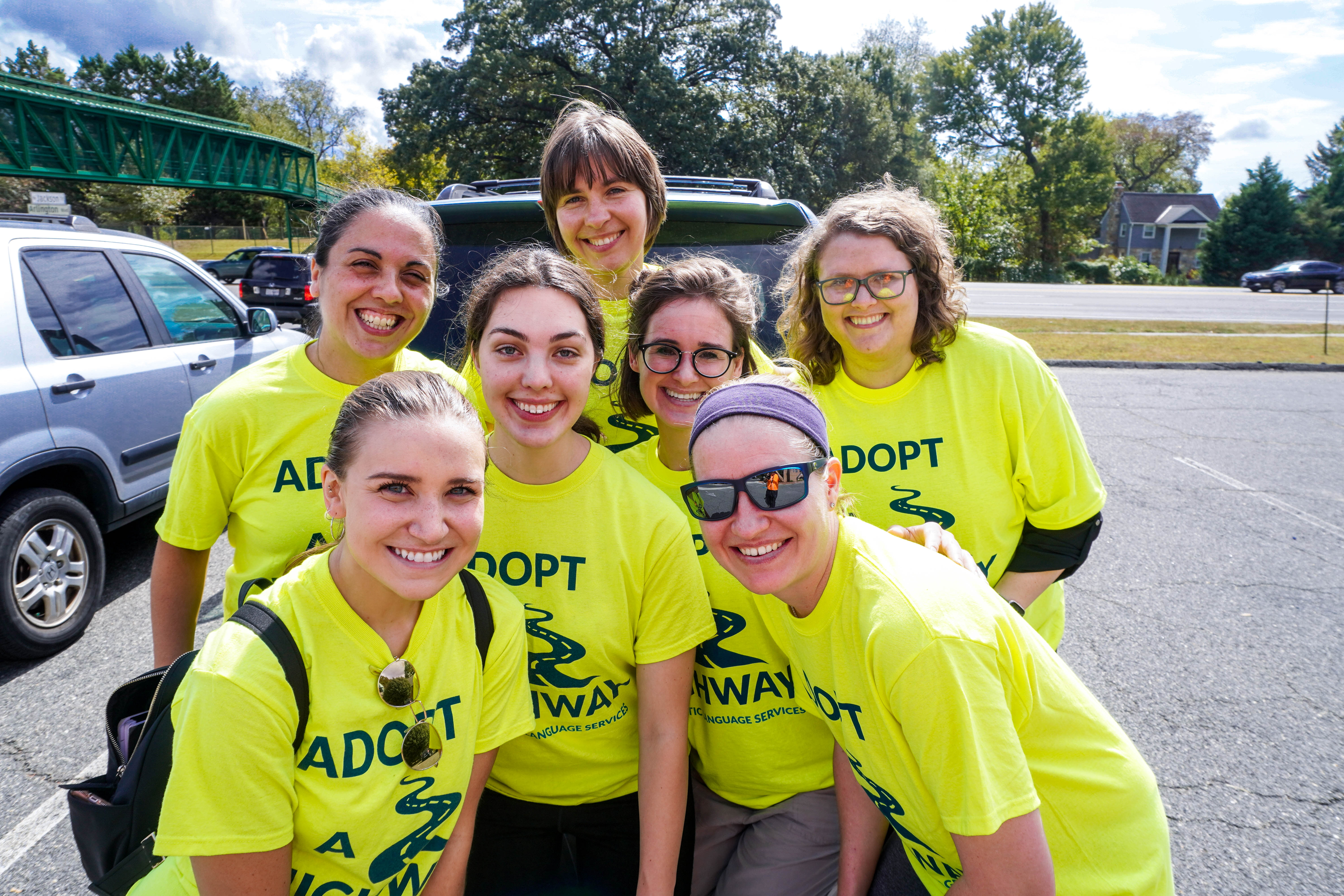 Diplomatic Language Services staff members get ready to clean up trash on Route 50 in the Washington DC metro area