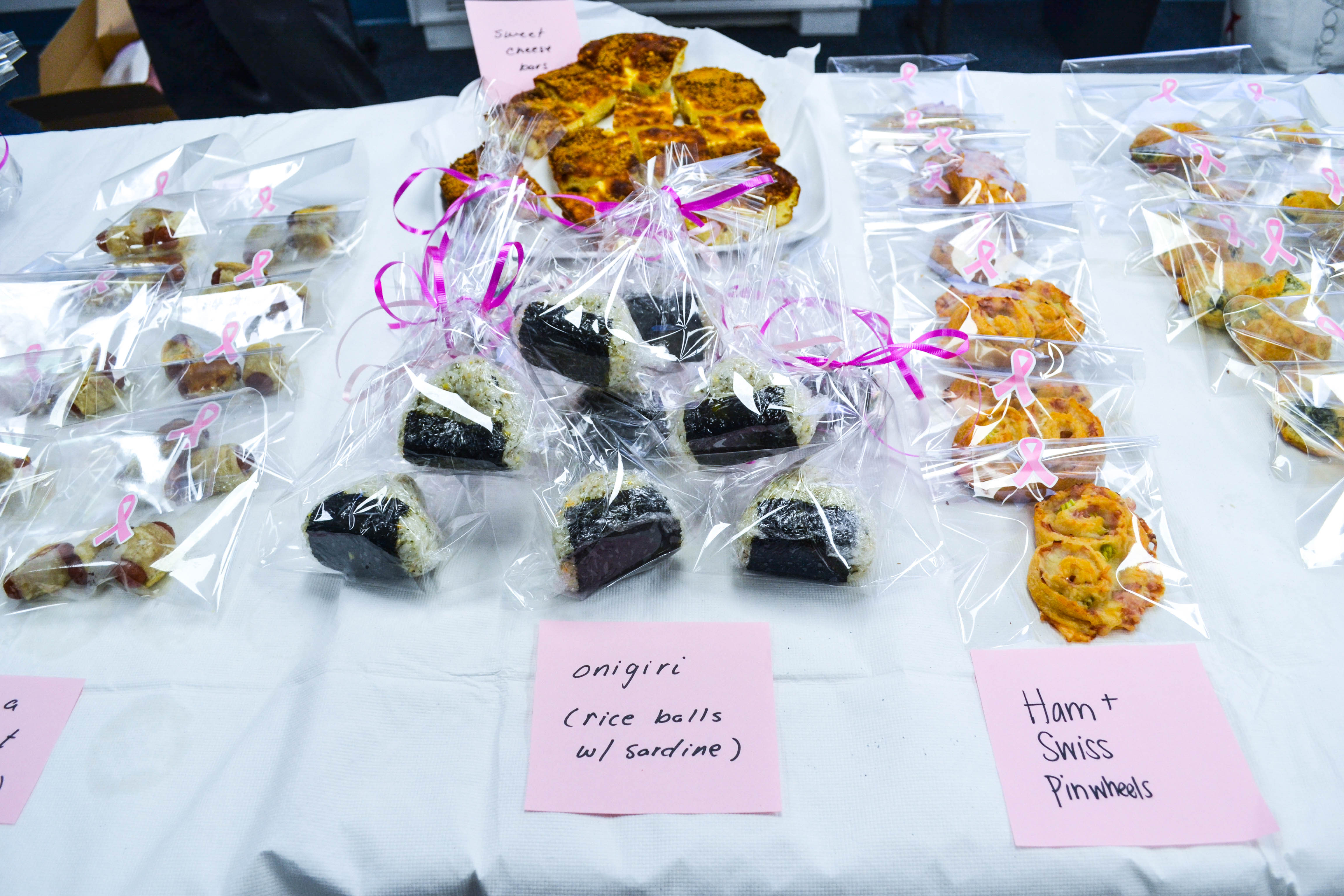 Onigiri and baked pinwheels sold at Diplomatic Language Services Susan G. Komen Bake Sale