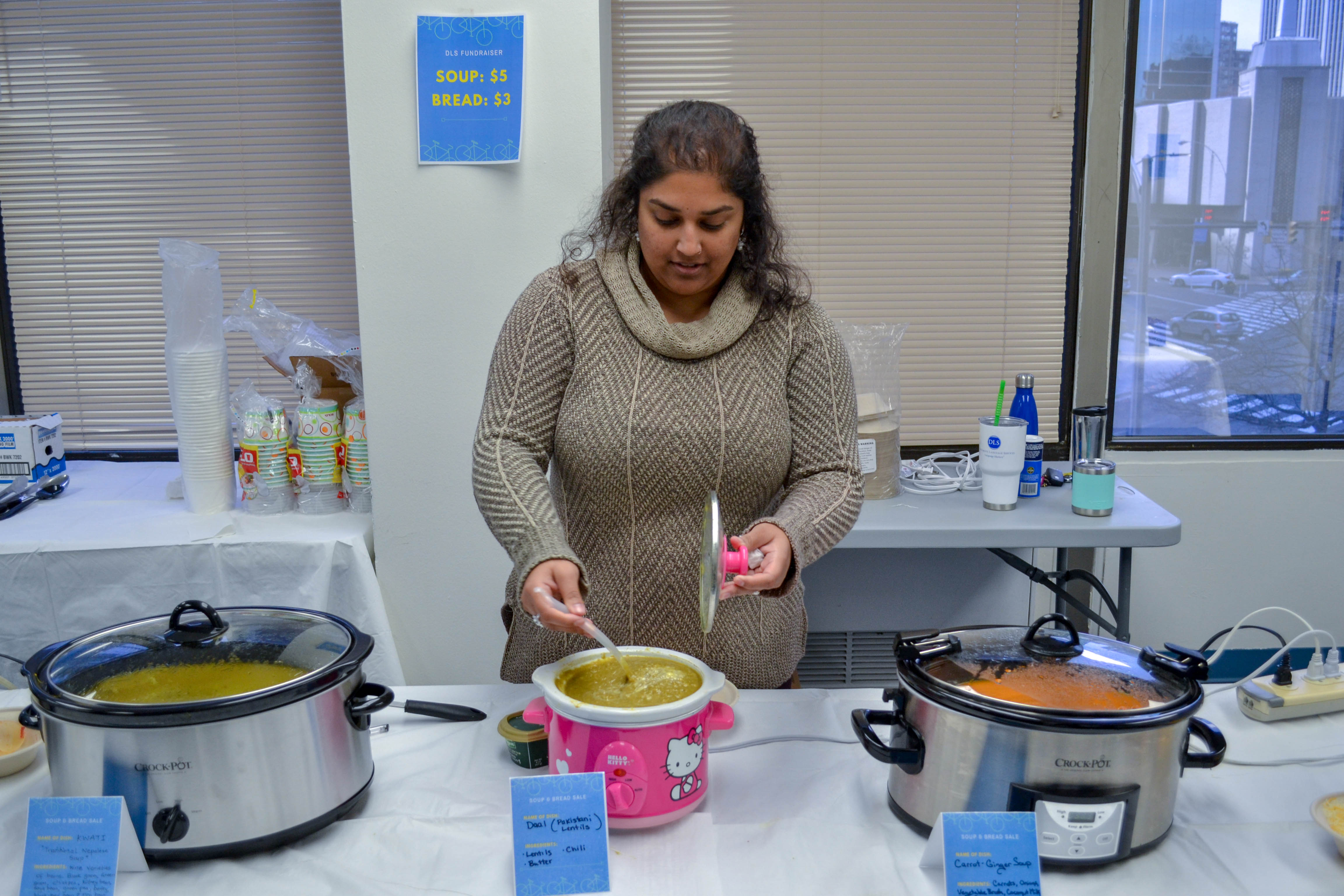 Diplomatic Language Services staff member serves soup to raise money for The National Multiple Sclerosis Society