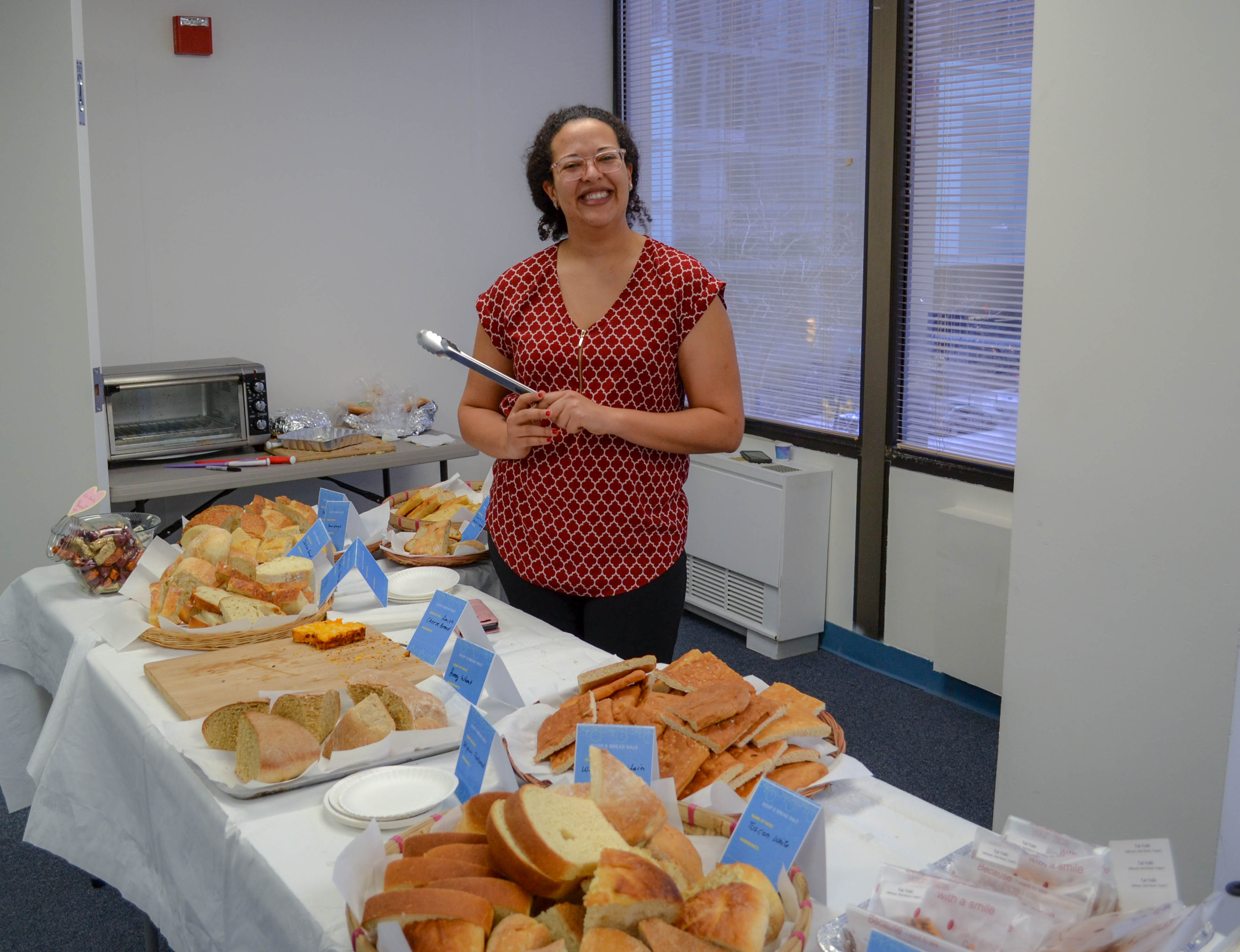 Diplomatic Language Services staff member serves bread to raise money for The National Multiple Sclerosis Society