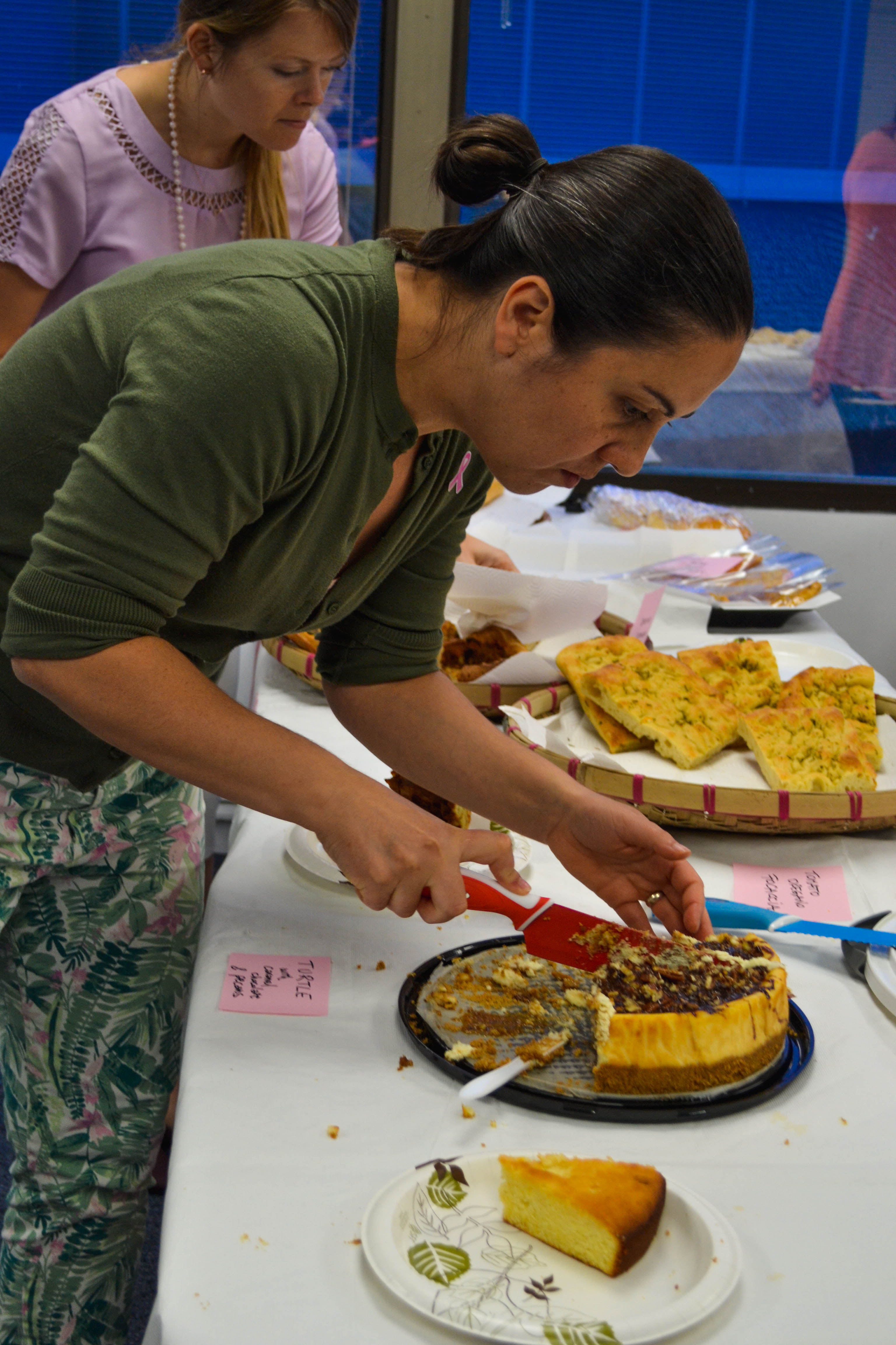 Diplomatic Language Services staff members enjoy 2018 Race For The Cure Bake Sale